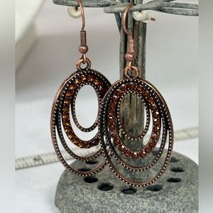Copper ovals within ovals earrings with rhinestones